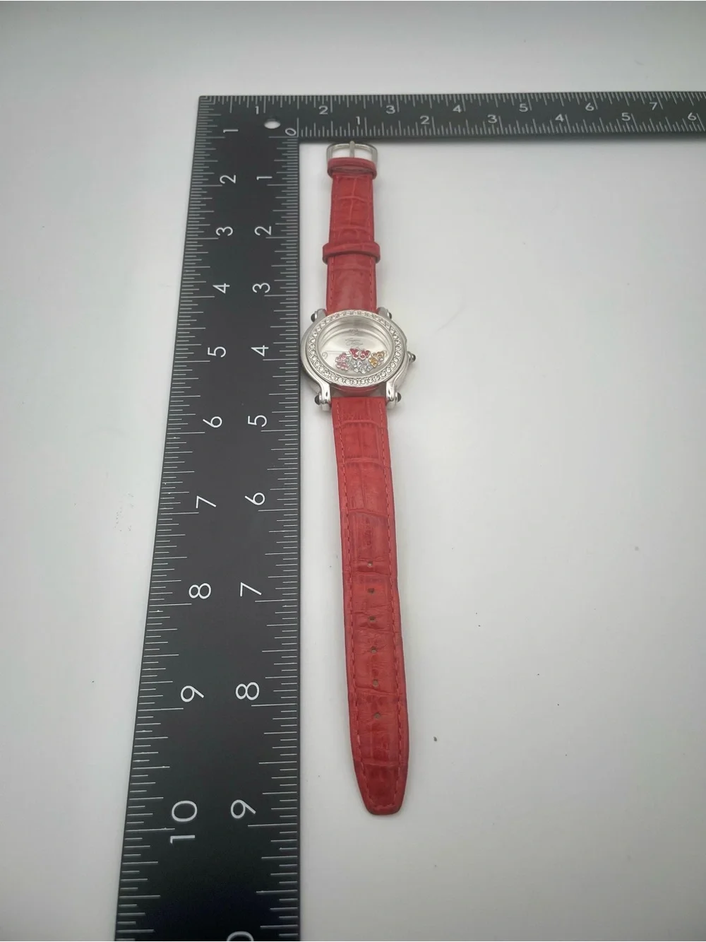 Suzanne Somers Watch with Floating 4 Rhinestone Butterflies. Red Leather Band